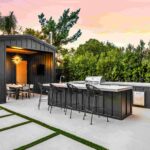 modern-outdoor-kitchen-and-dining-area-at-sunset-2026-01-07-23-12-57-utc-2