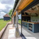 open-air-kitchen-and-backyard-in-modern-home-2026-01-09-10-40-06-utc-2