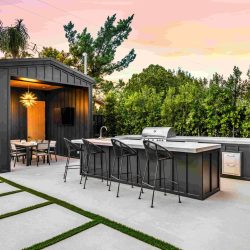 modern-outdoor-kitchen-and-dining-area-at-sunset-2026-01-07-23-12-57-utc-2